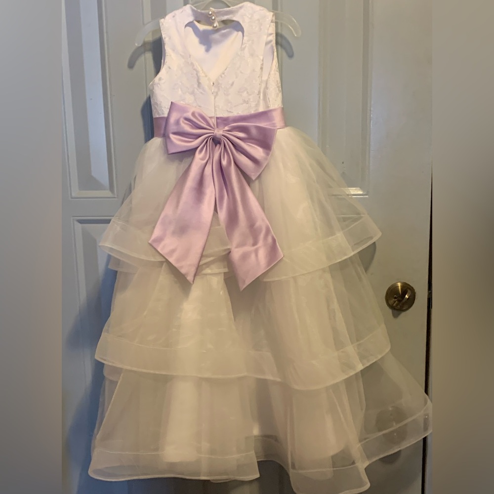 Flower girl dresses there is 2 of the same were twins,only worn about 2 hours